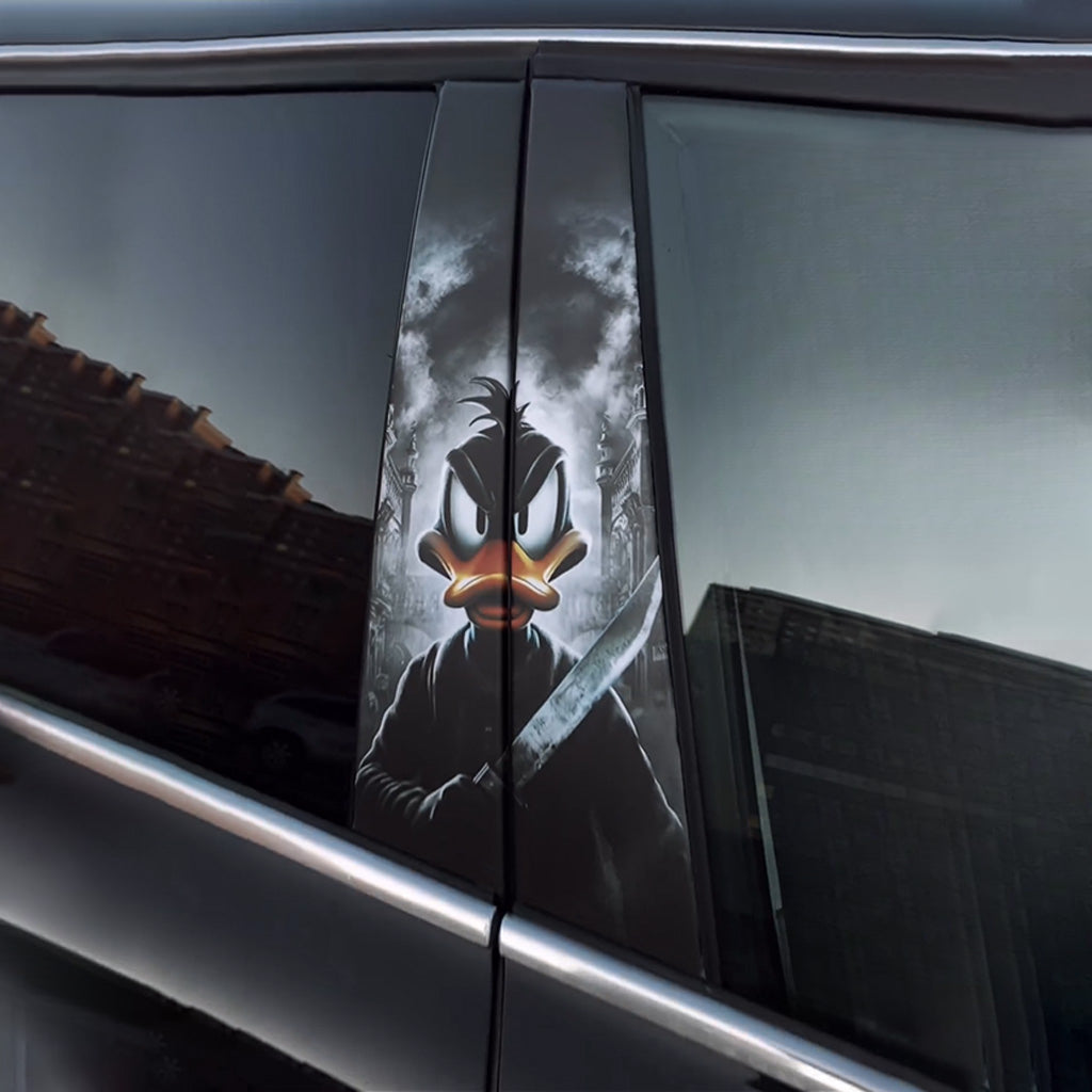 A custom car window sticker featuring a dark-themed Daffy Duck holding a knife, set against a gloomy sky. This unique horror cartoon decal is perfect for personalizing your vehicle's side window.
